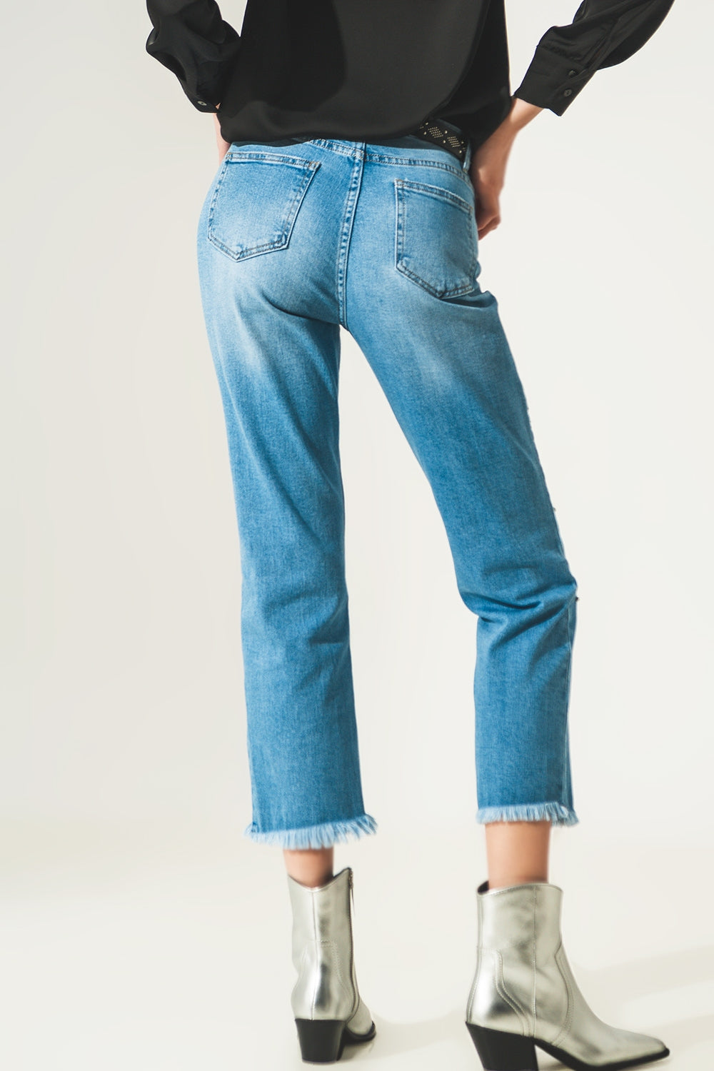 Jean déchiré en denim à strass