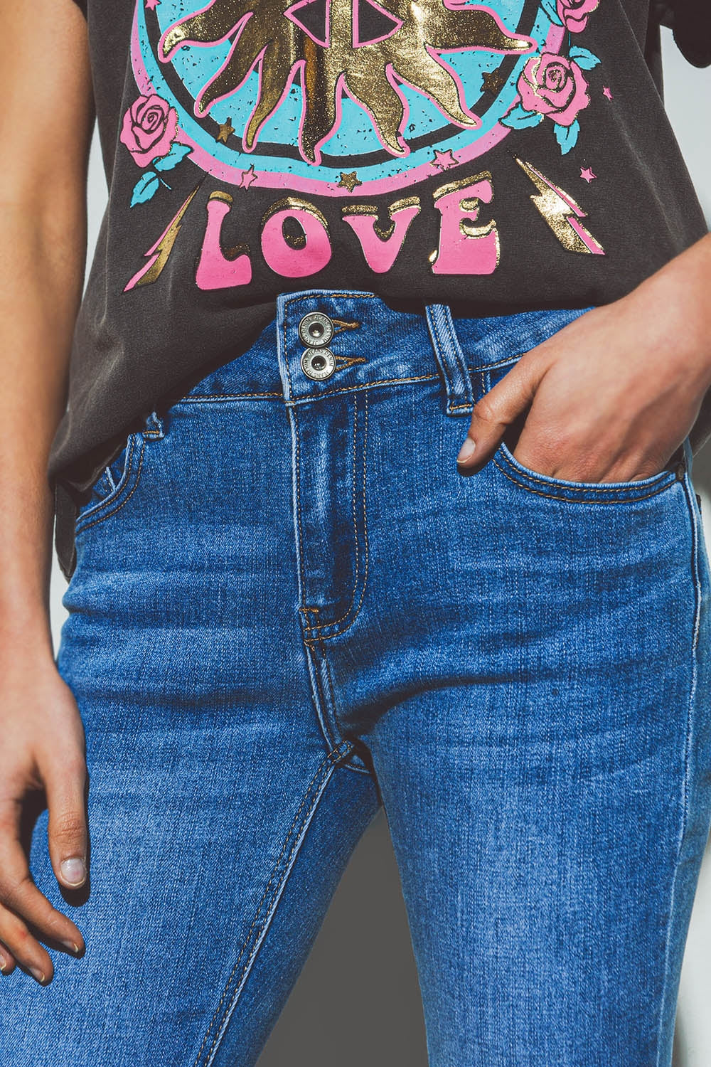 Jean évasé à taille double boutonnée en denim bleu