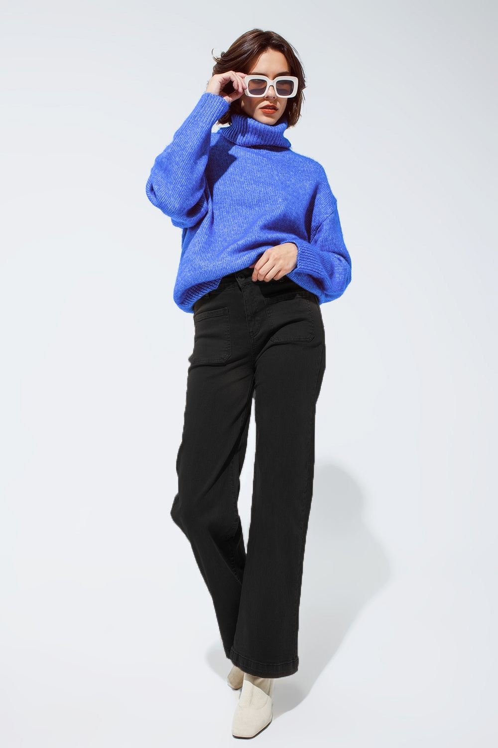 jean flare à taille haute et poches avant en noir