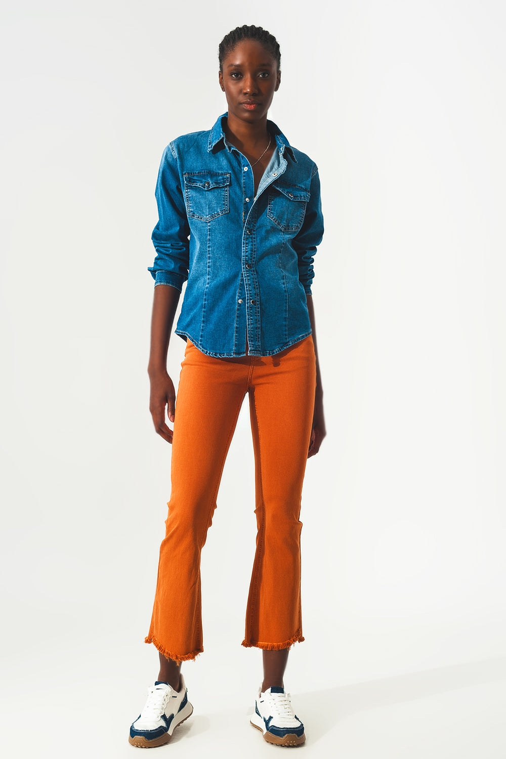Jean flare avec bord brut en orange