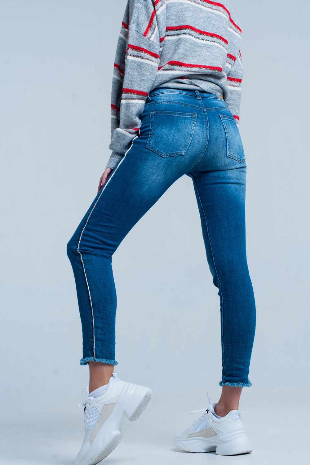 Jean skinny à franges avec bande latérale en strass