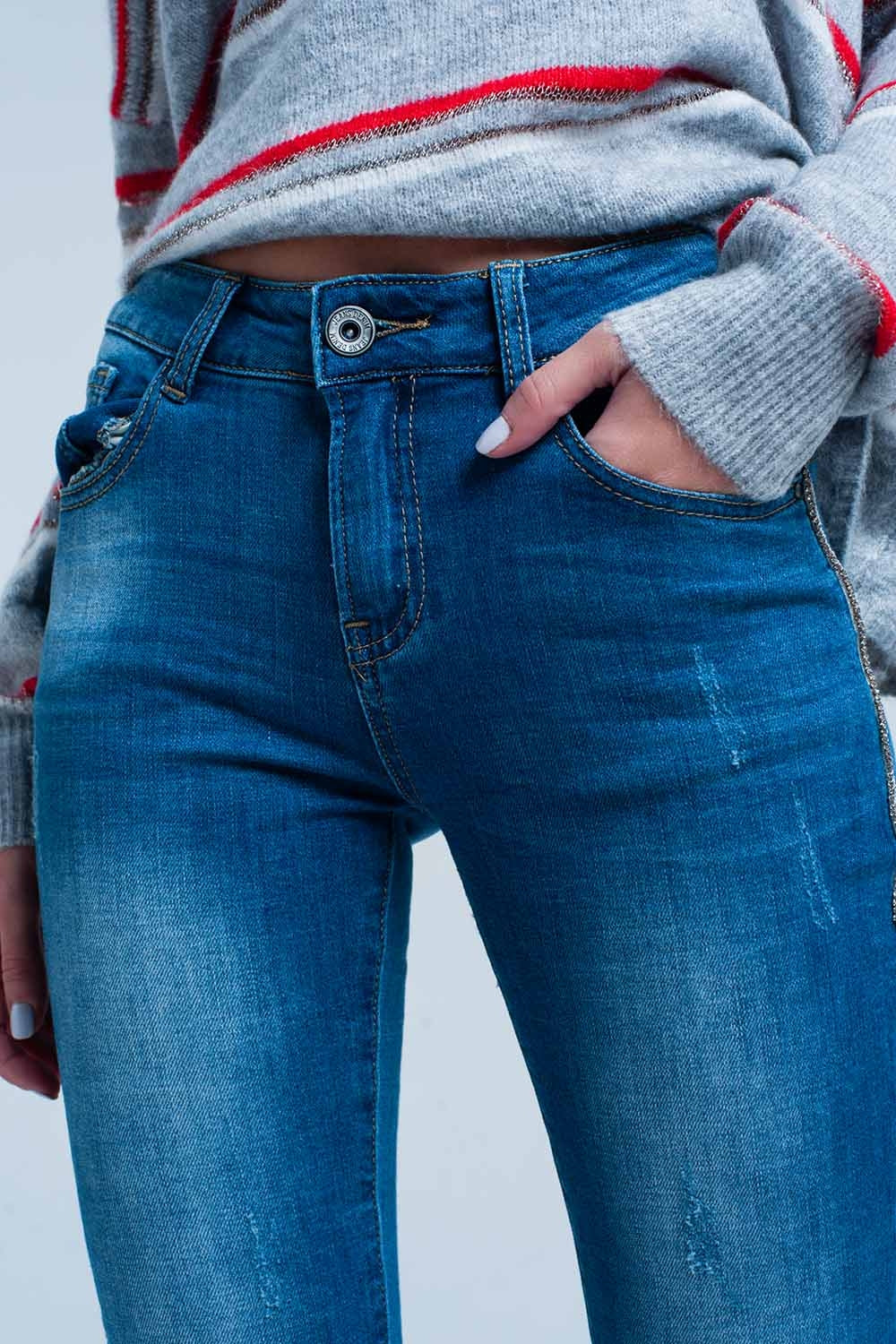 Jean skinny à franges avec bande latérale en strass