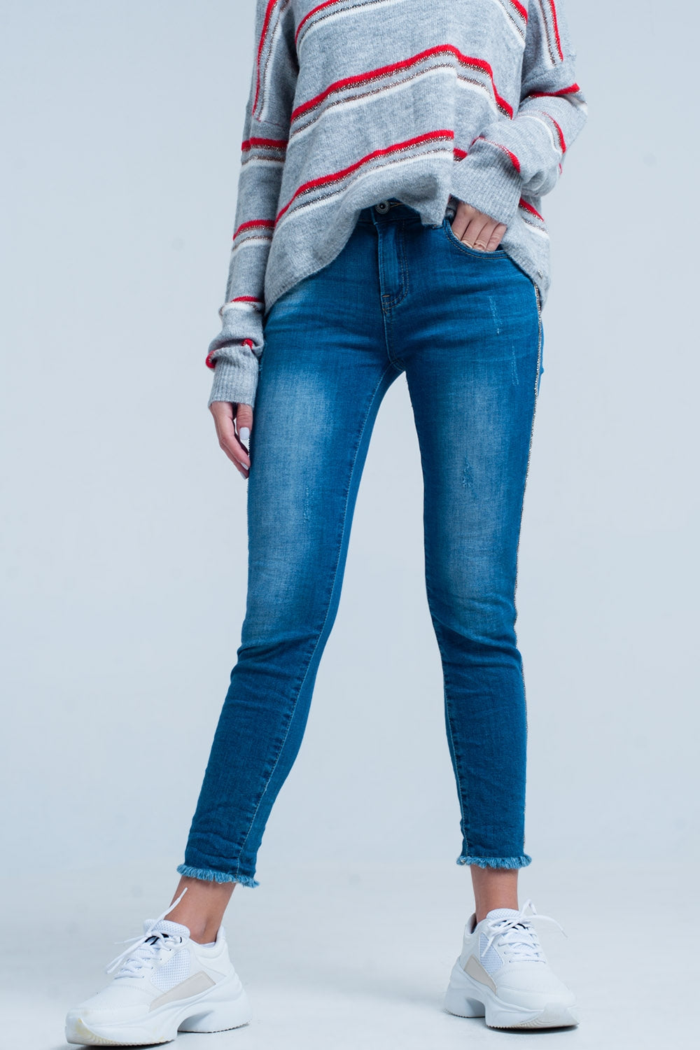 Jean skinny à franges avec bande latérale en strass