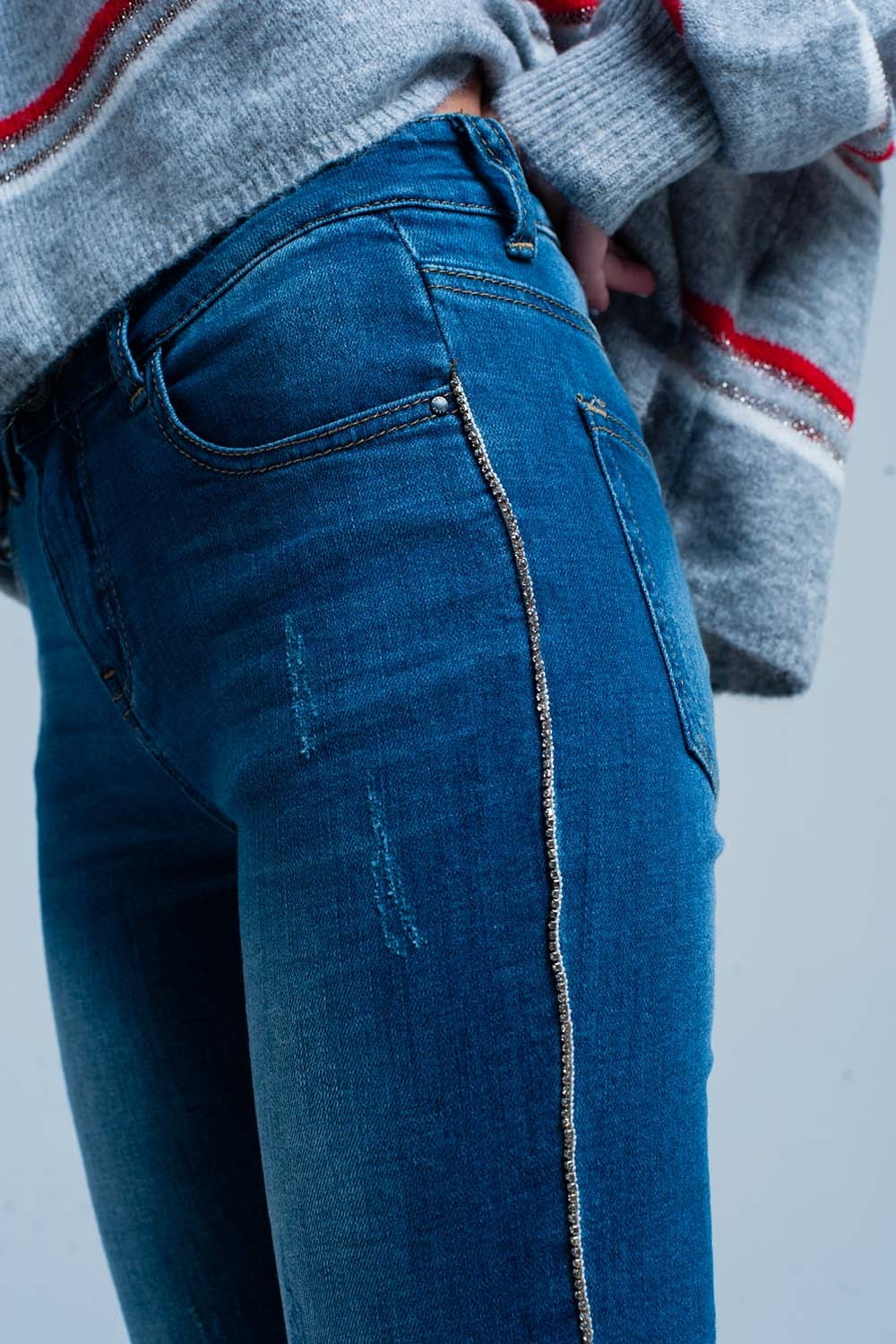 Jean skinny à franges avec bande latérale en strass