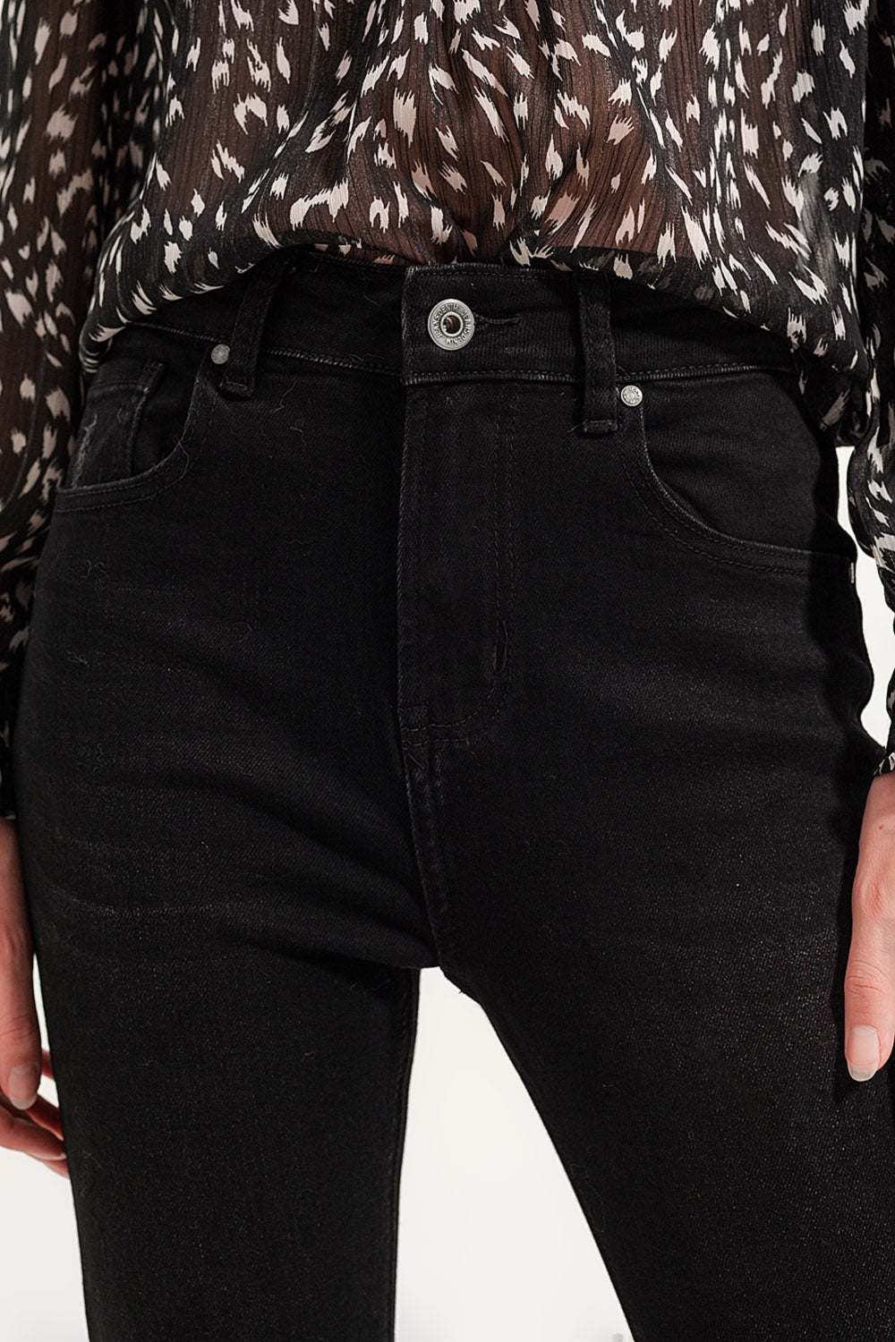 Jean skinny à ourlets bruts Noir