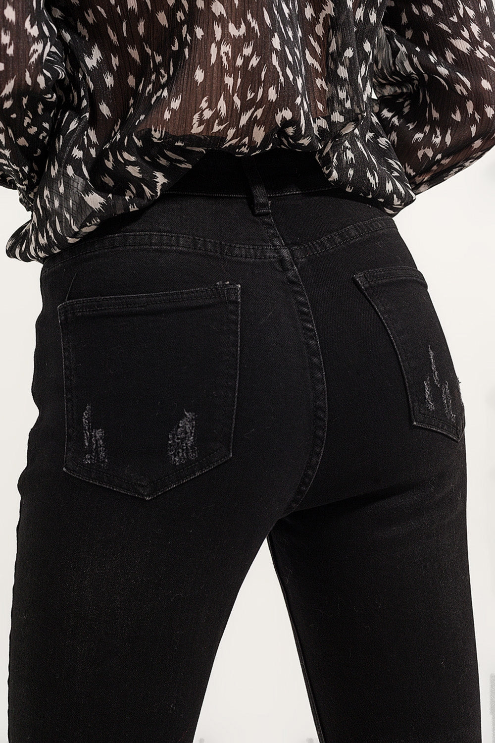 Jean skinny à ourlets bruts Noir