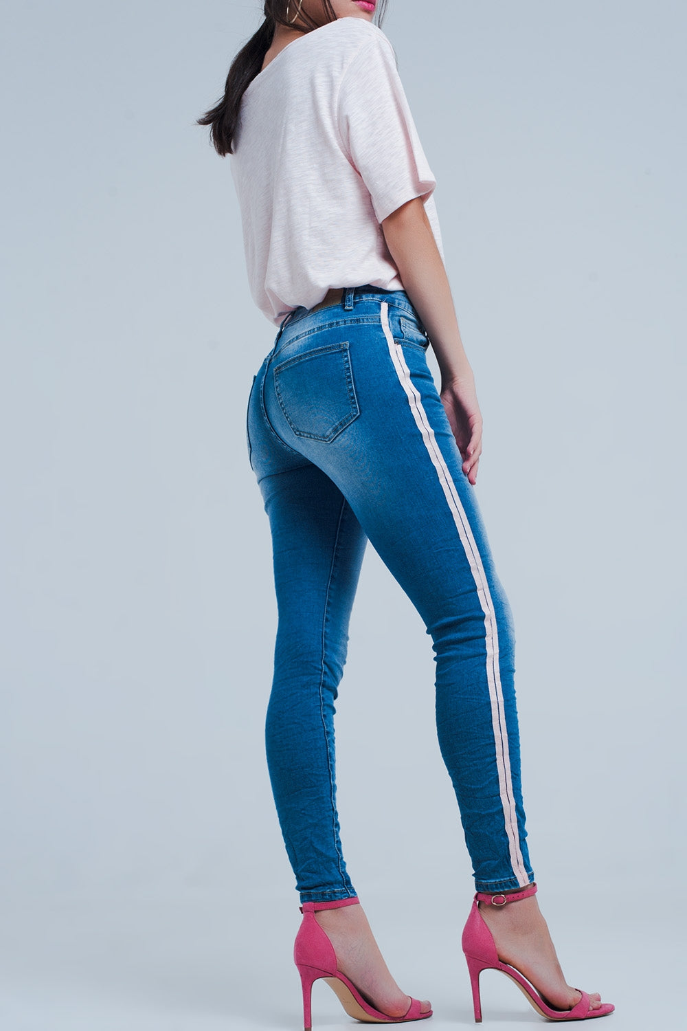 Jean skinny à rayures latérales roses