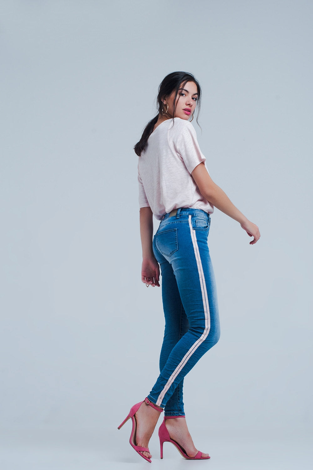 Jean skinny à rayures latérales roses