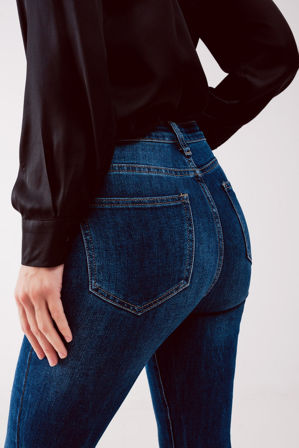 Jean skinny à taille haute et déchirures Bleu délavé moyen