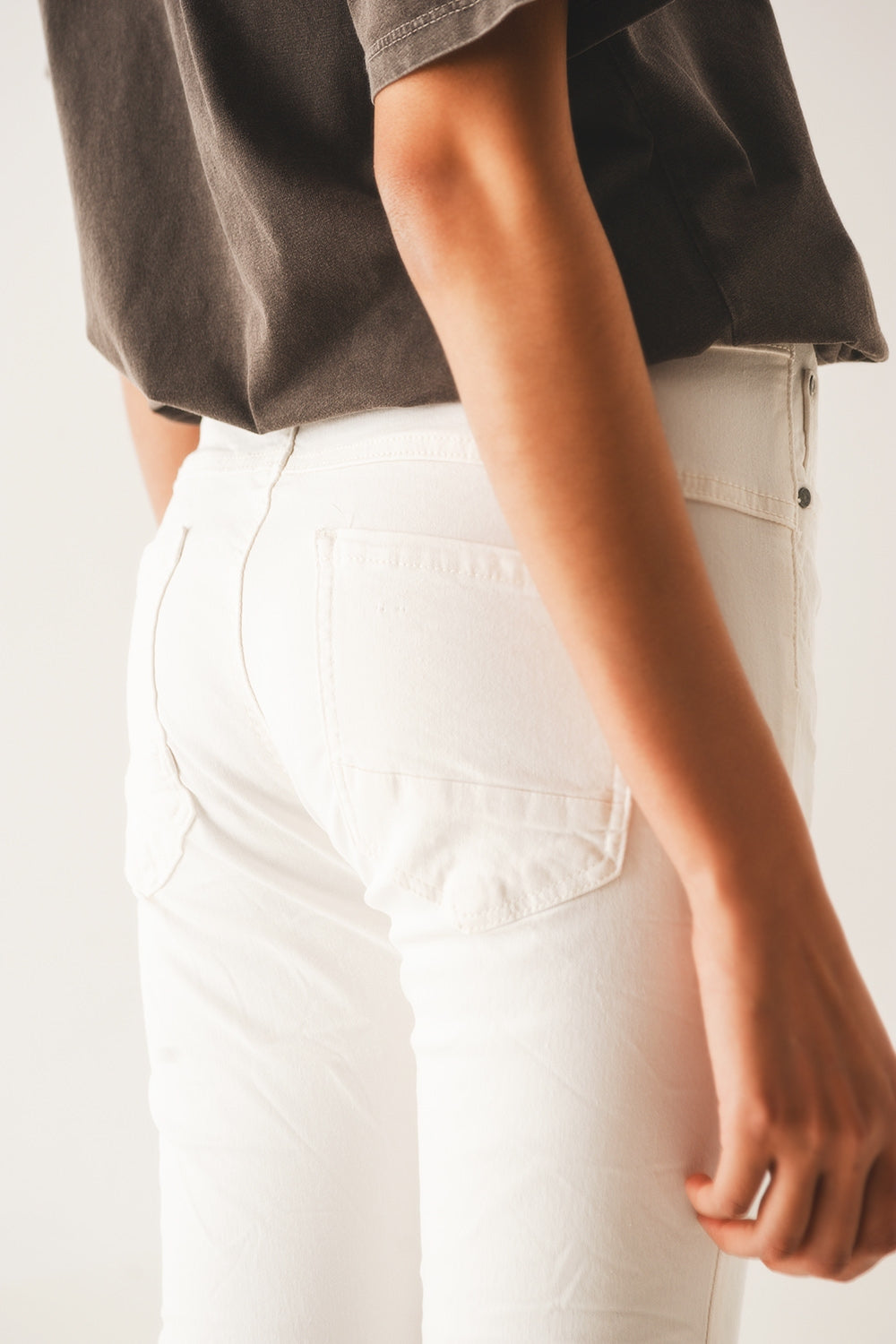 Jean skinny avec boutons visibles creme