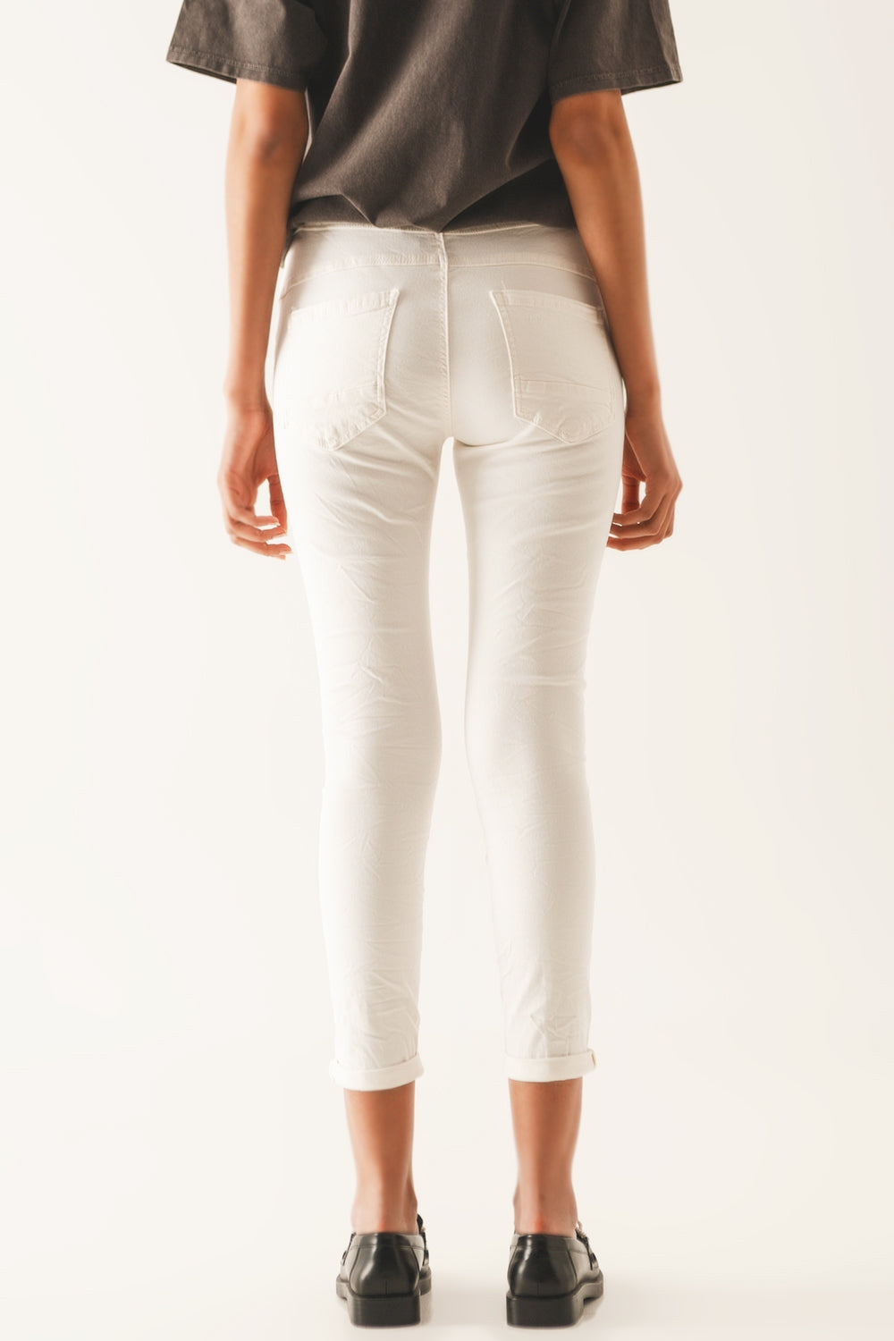 Jean skinny avec boutons visibles creme