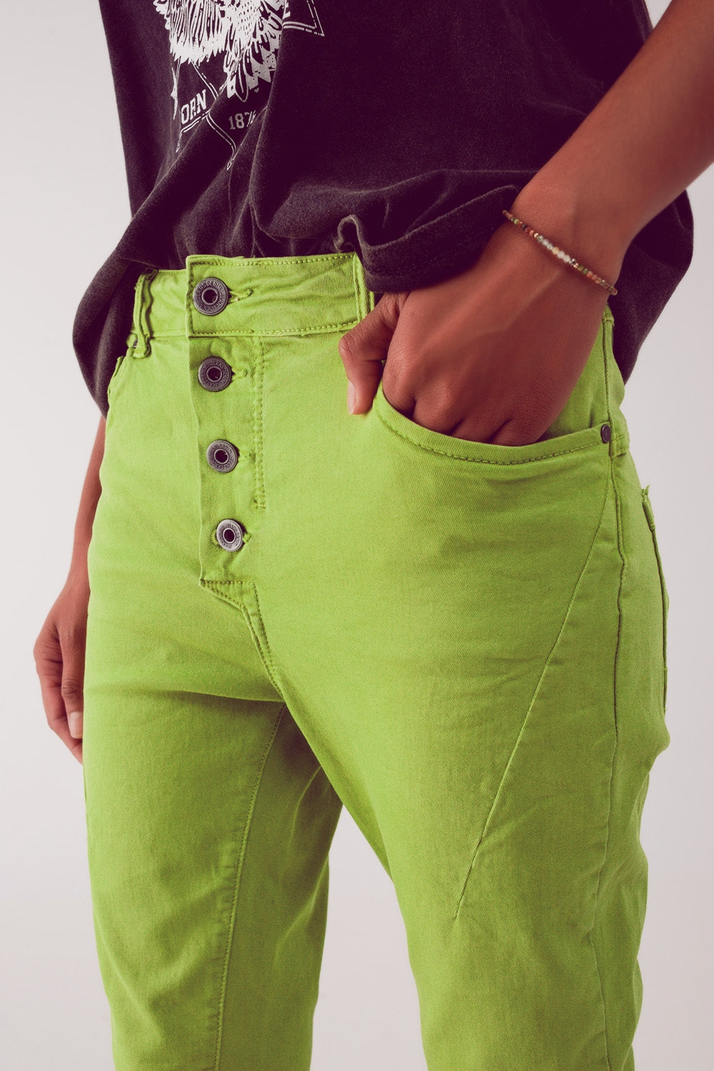 Jean skinny avec boutons visibles vert