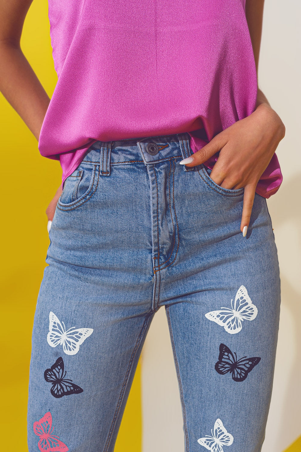 Jean skinny avec détail papillon délavé bleu clair