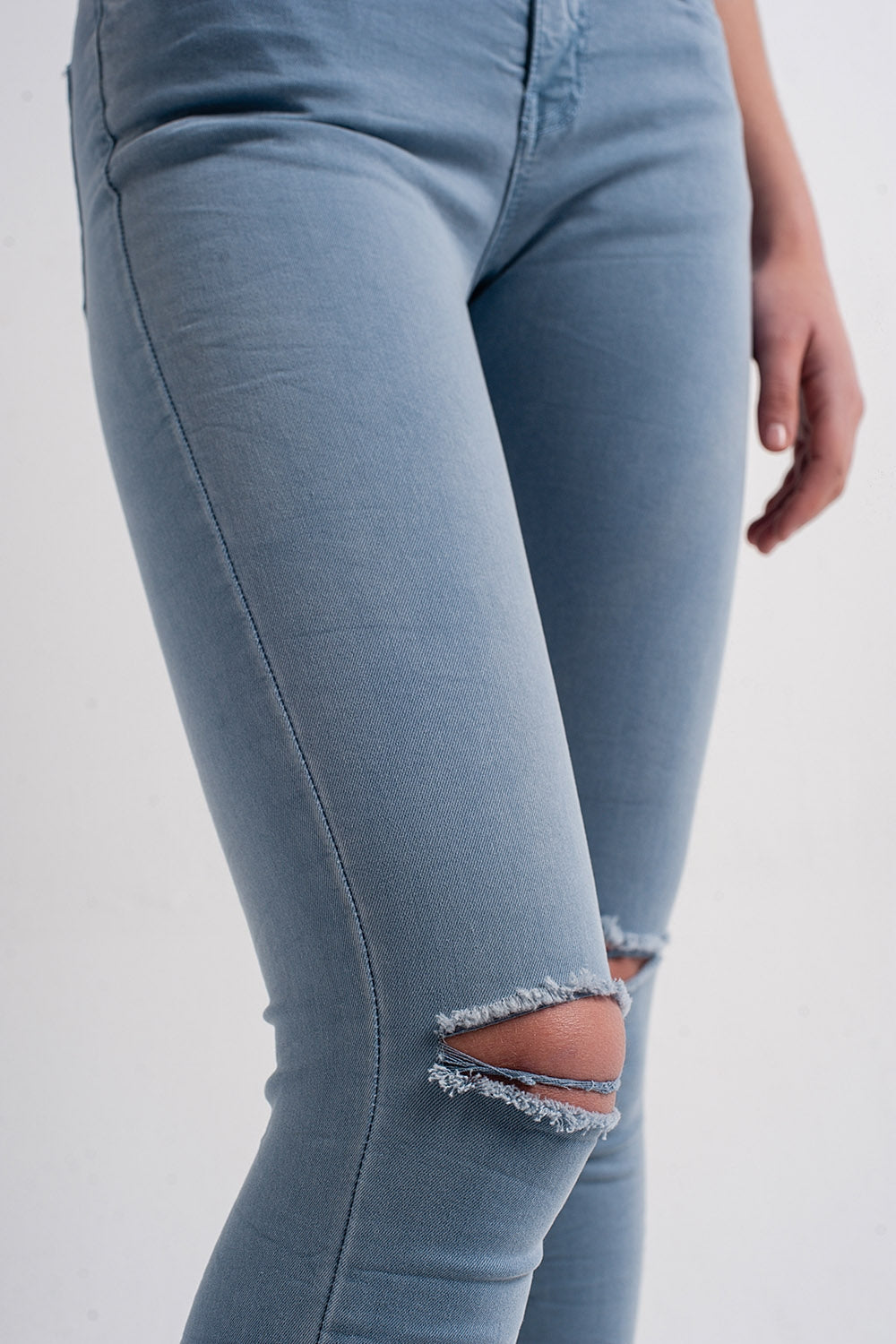 Jean skinny avec genoux déchirés Bleu