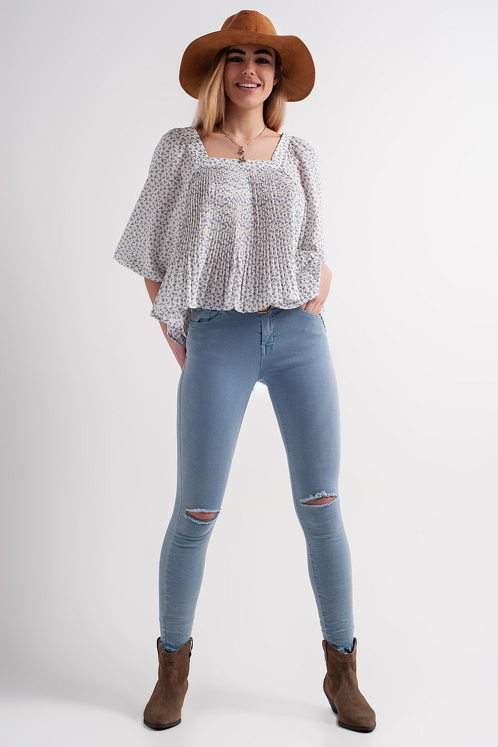 Jean skinny avec genoux déchirés Bleu