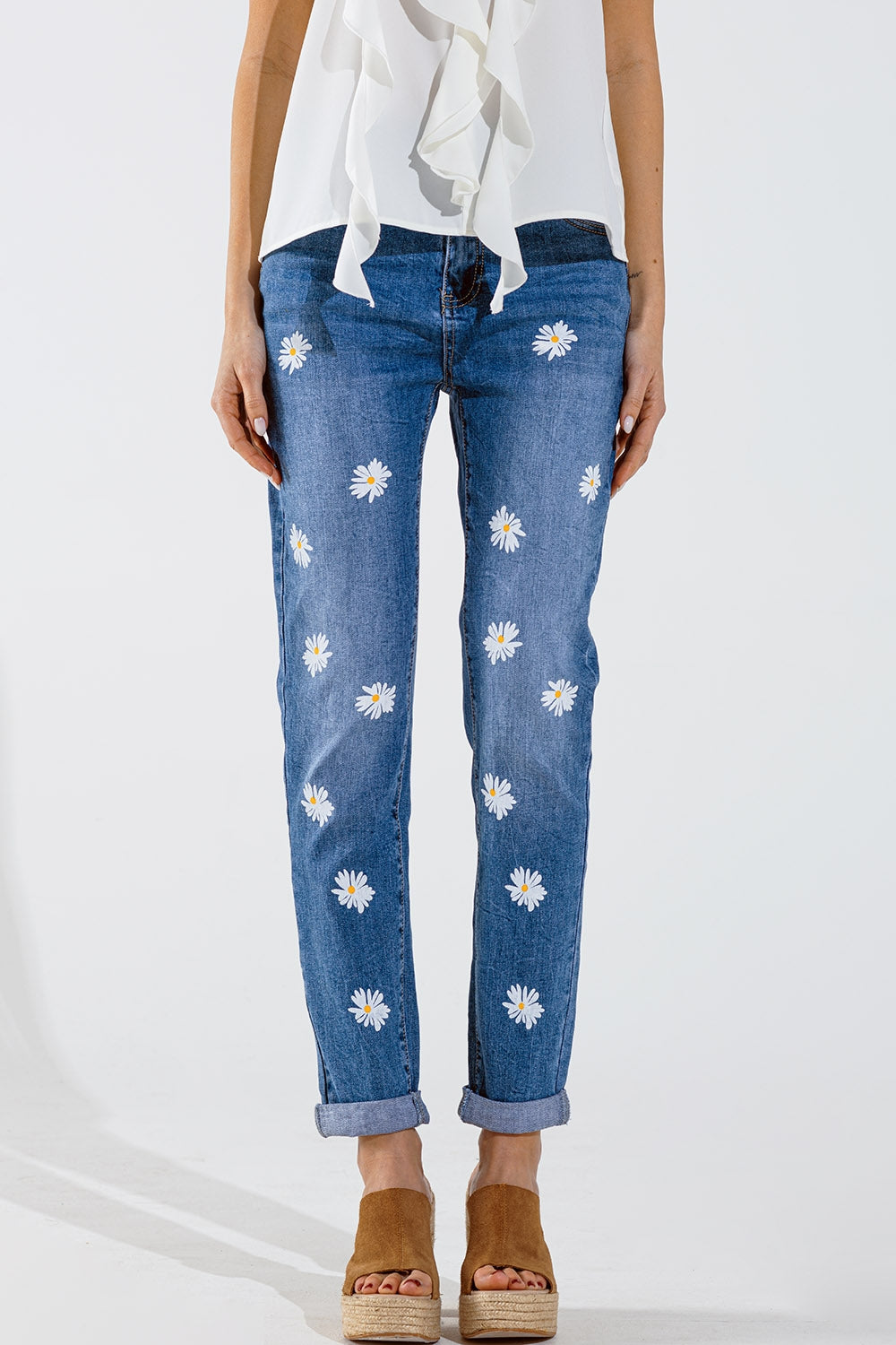 Q2 Jean skinny avec marguerites blanches imprimées délavage moyen