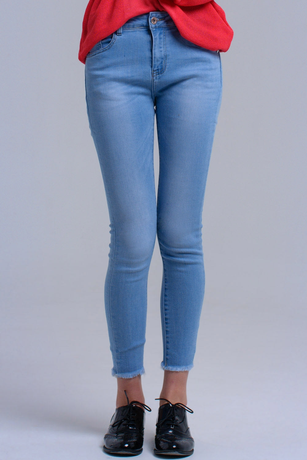 Jean skinny bleu clair avec franges