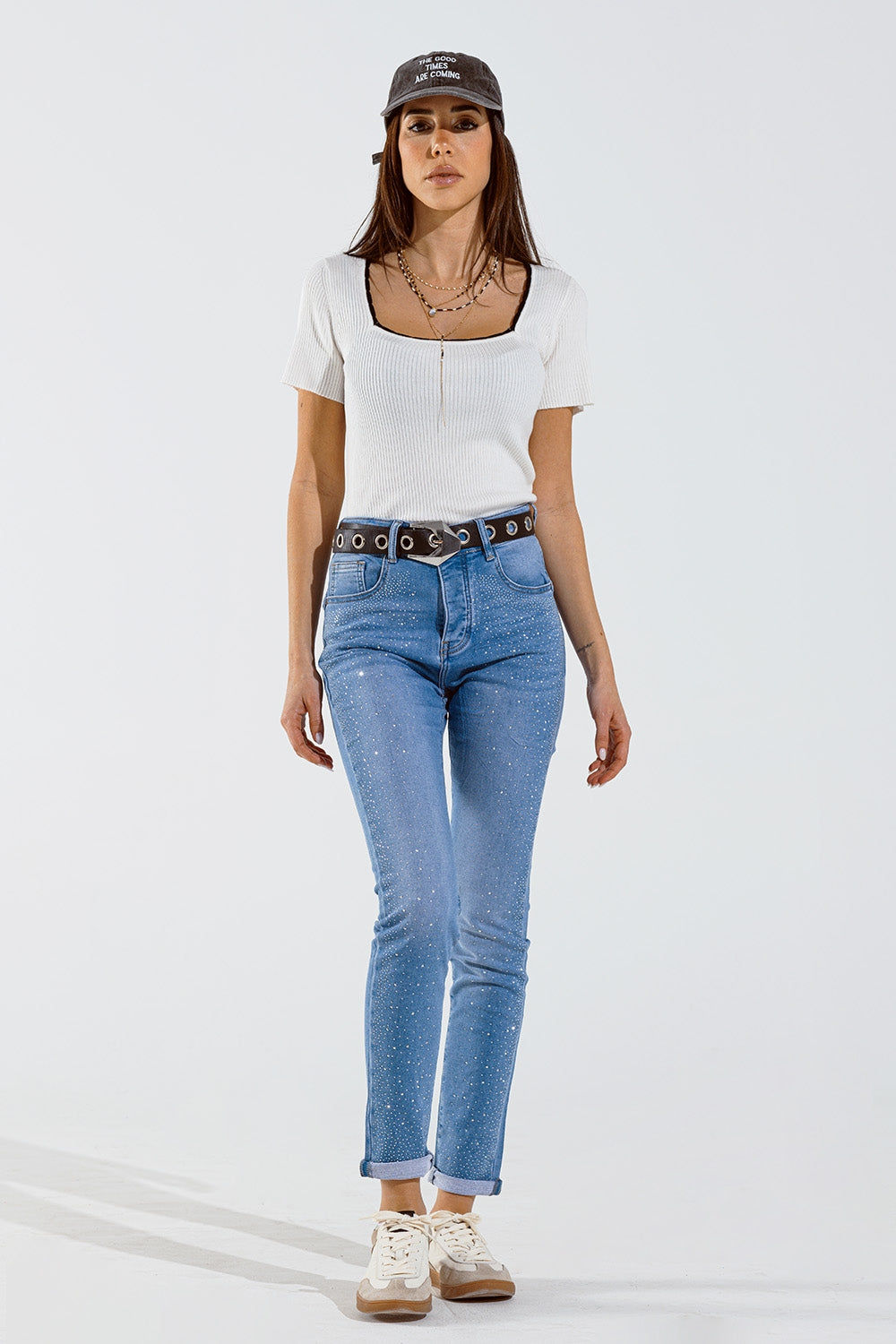 Jean skinny bleu délavé avec strass sur le devant