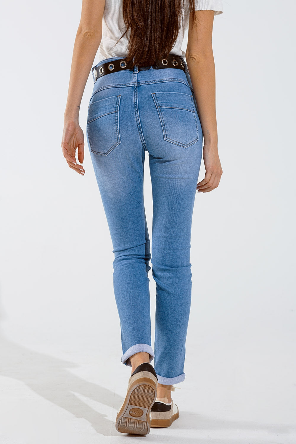 Jean skinny bleu délavé avec strass sur le devant