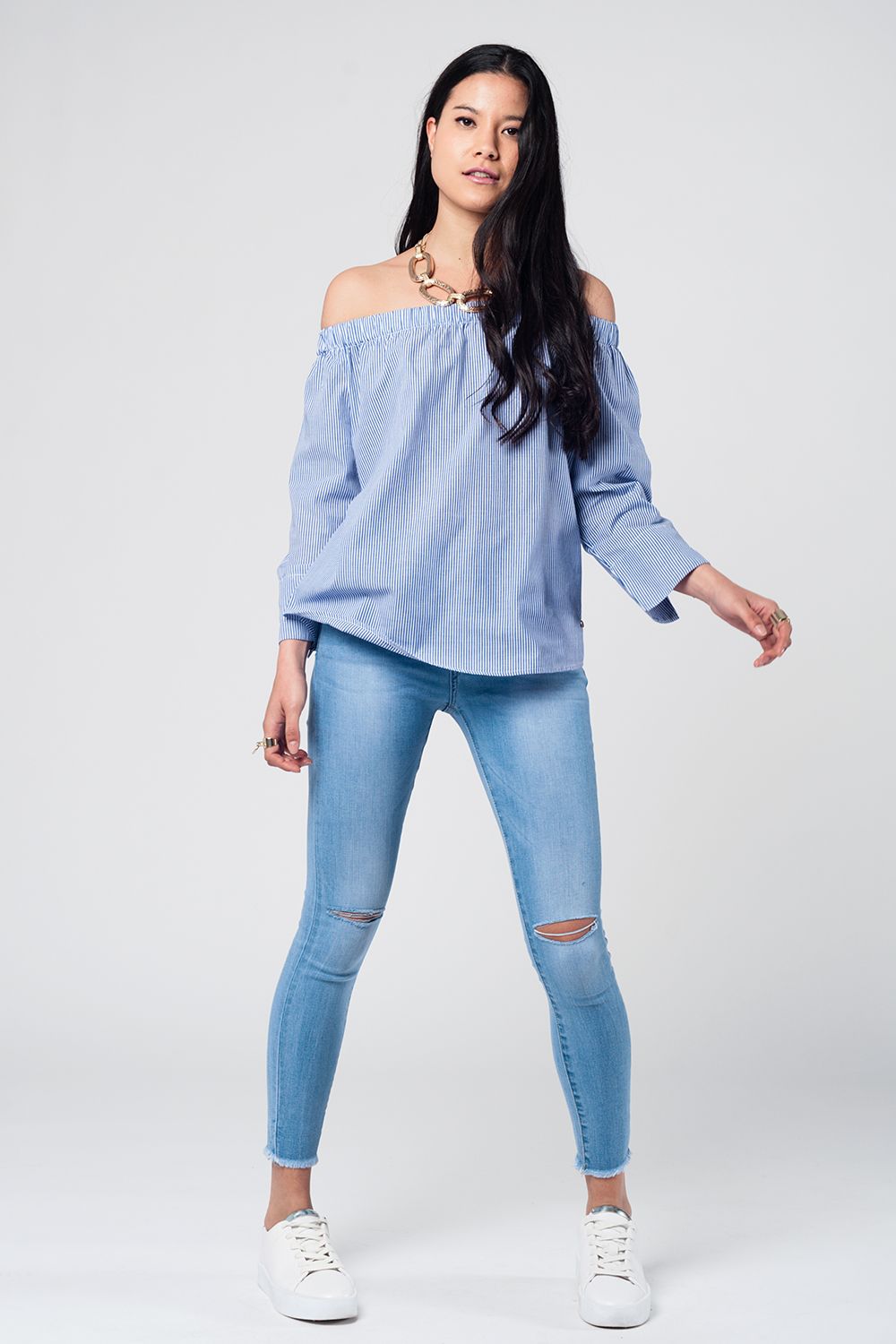 Jean skinny délavé avec découpe aux genoux