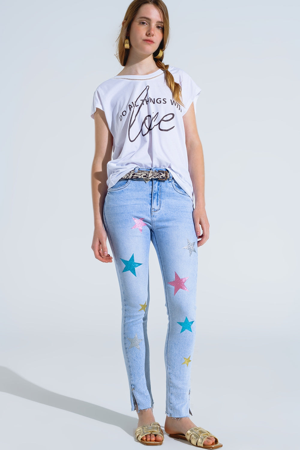 Jean skinny délavé avec étoiles sur les jambes