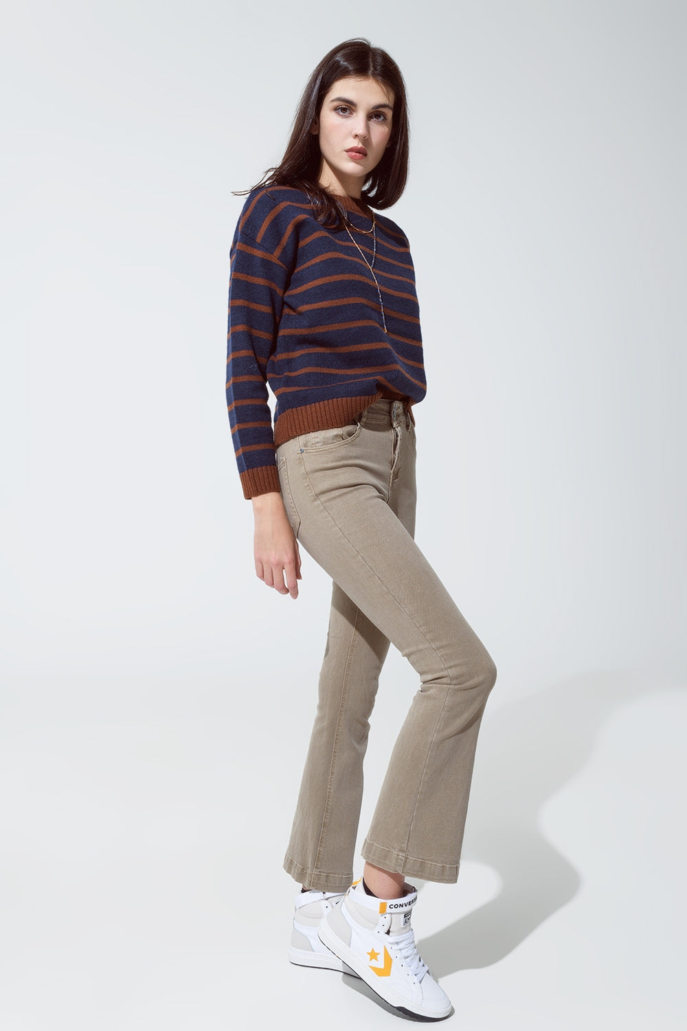 Jean skinny évasé avec double boutonnage en beige