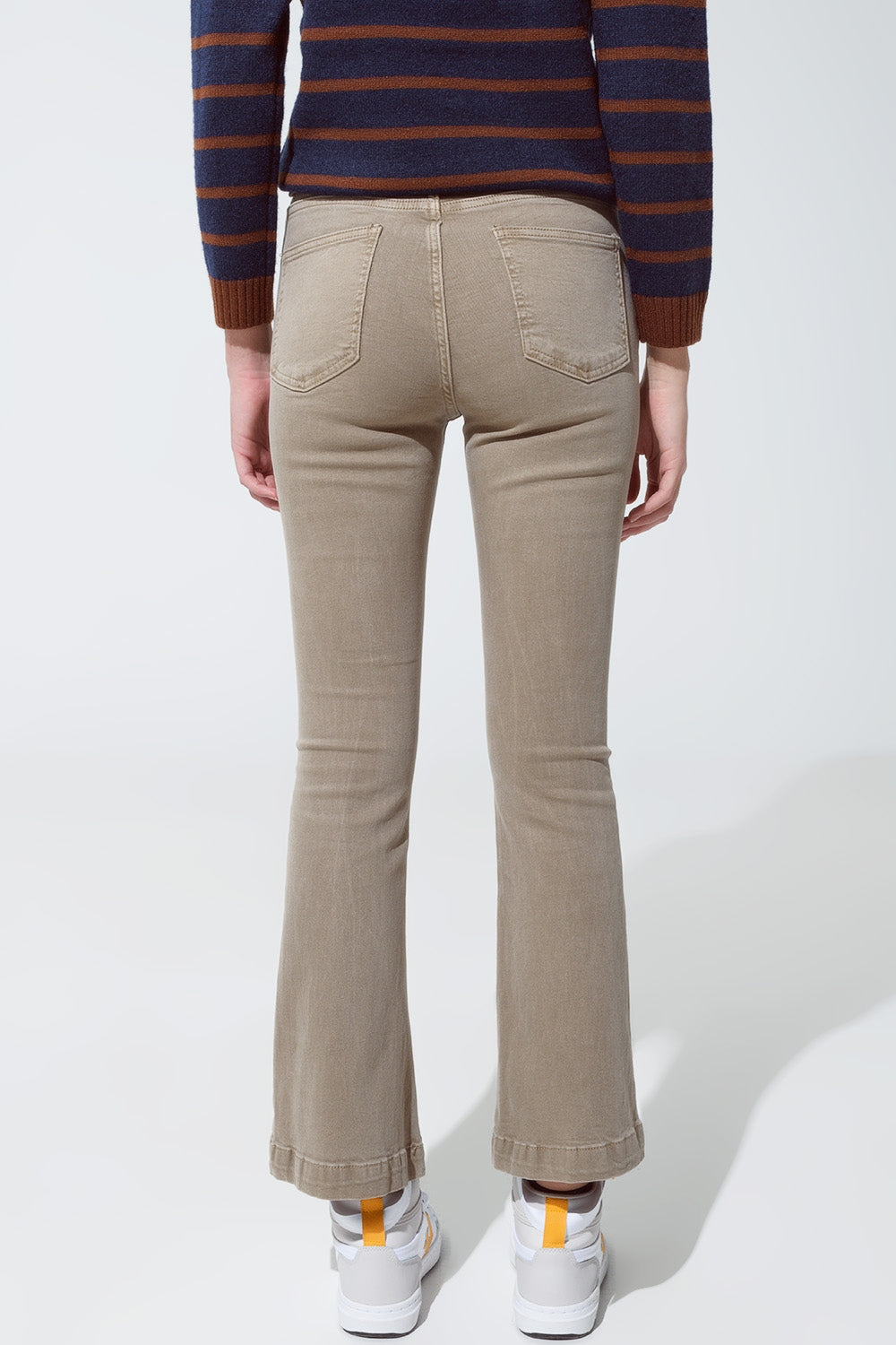 Jean skinny évasé avec double boutonnage en beige