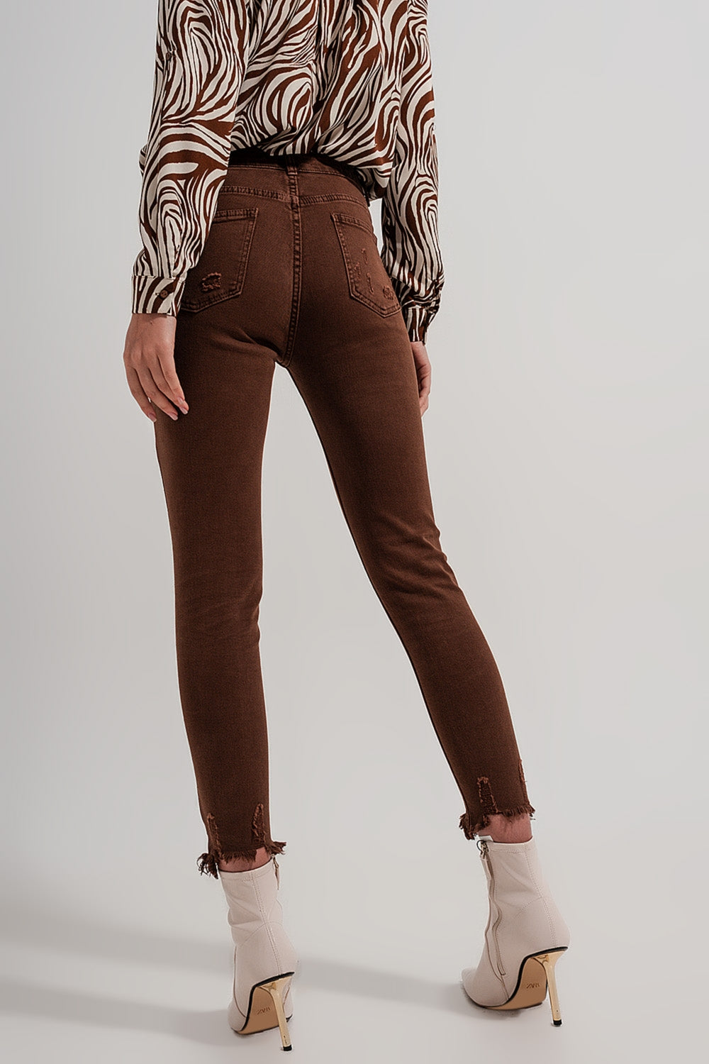 Jean skinny marron avec bords bruts