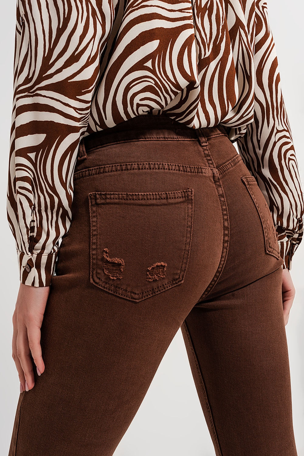Jean skinny marron avec bords bruts