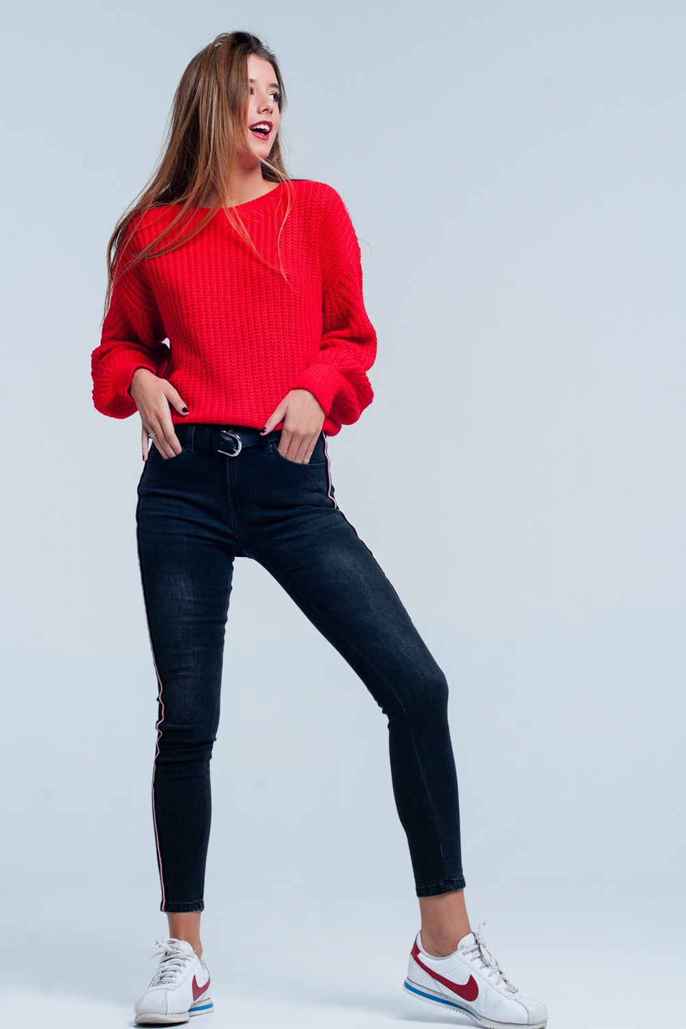 Jean skinny noir à rayures latérales rouges