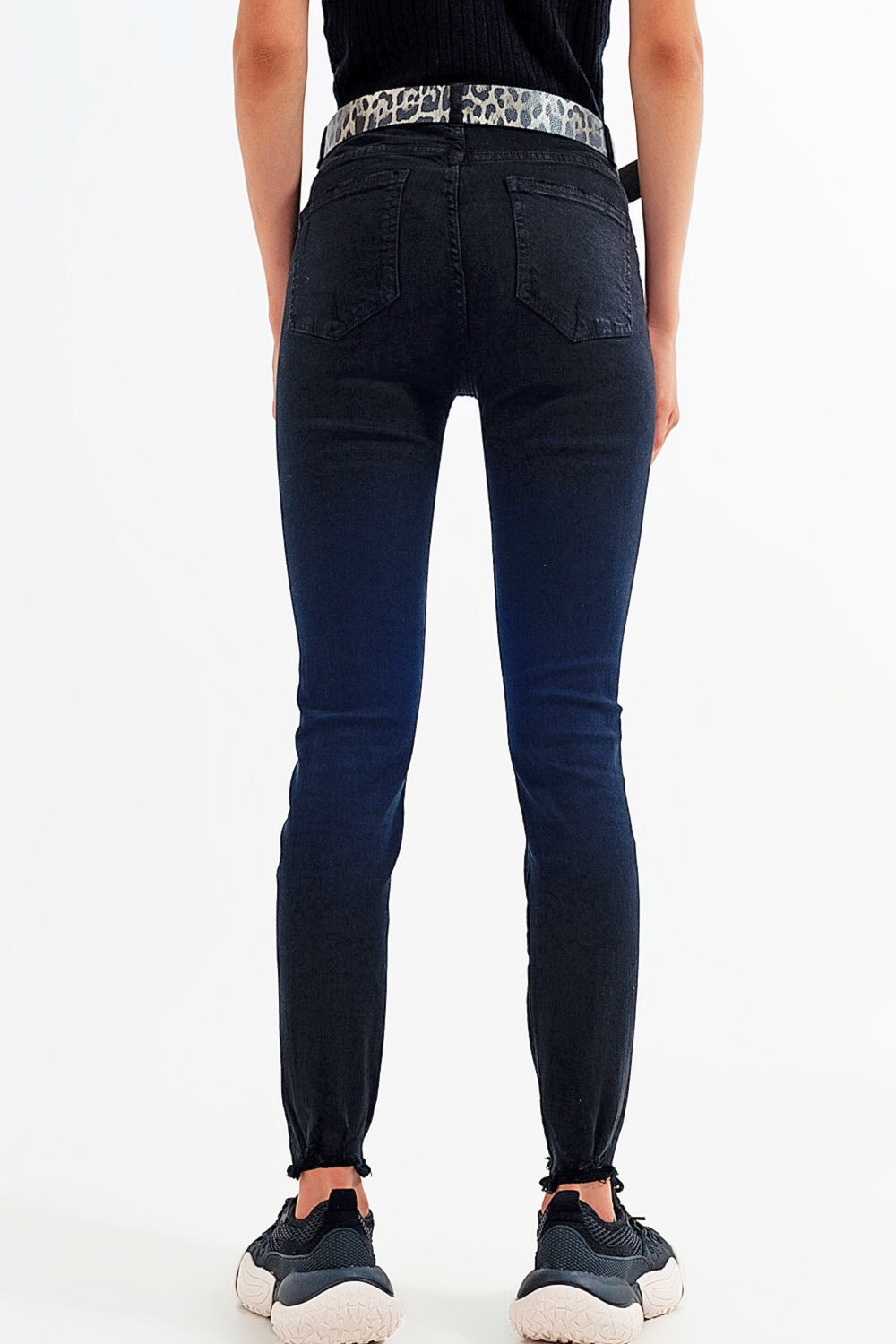 Jean skinny stretch à ourlets découpés Noir