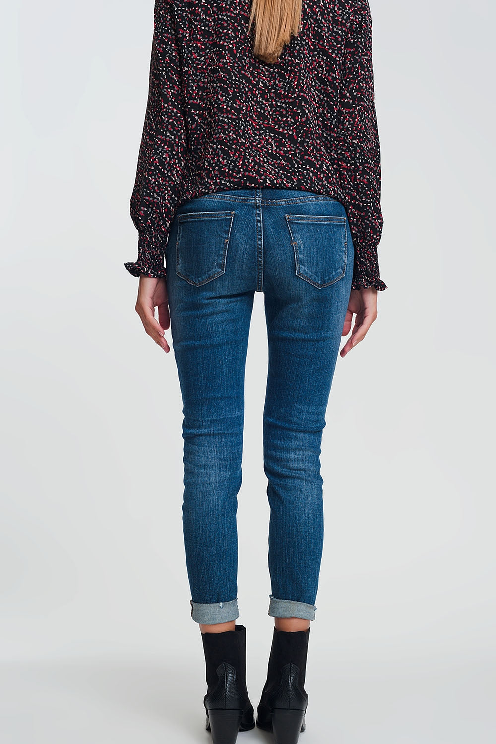 Jean skinny taille haute avec détails déchirés en Bleu délavage foncé