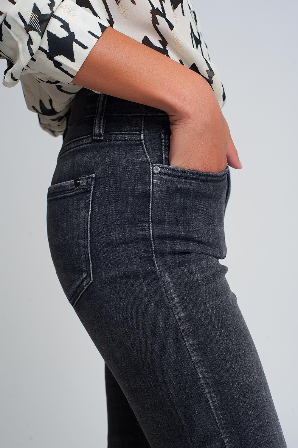 Jean skinny taille haute en Noir délavé