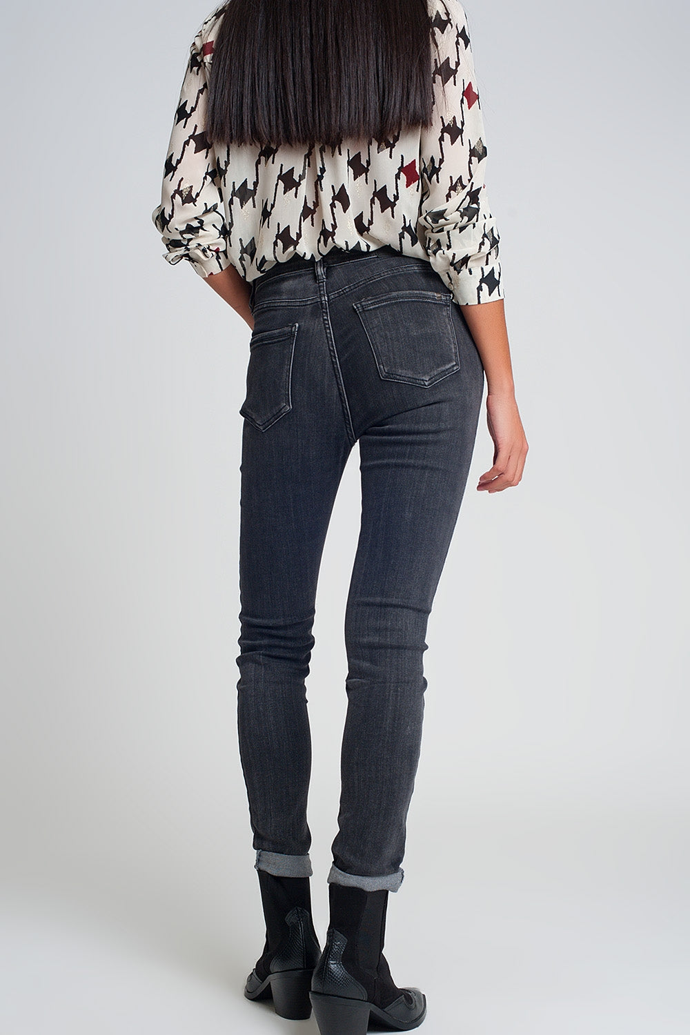Jean skinny taille haute en Noir délavé