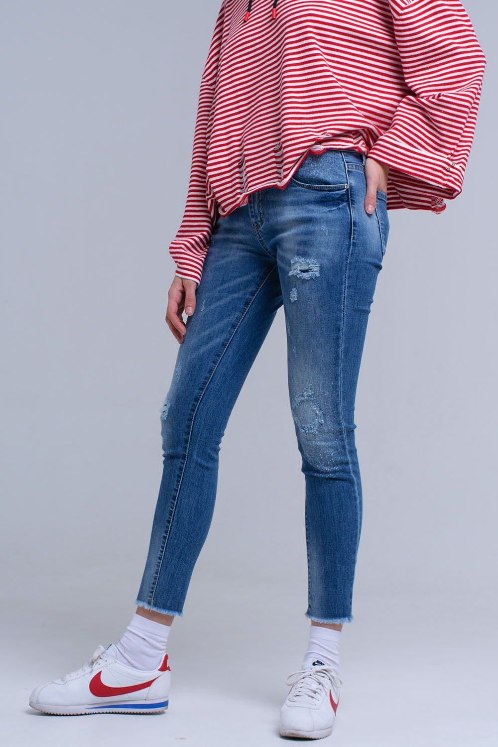 Jean skinny vieilli avec franges