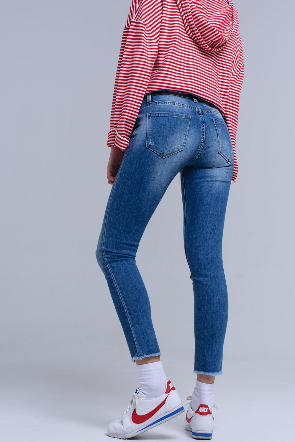 Jean skinny vieilli avec franges