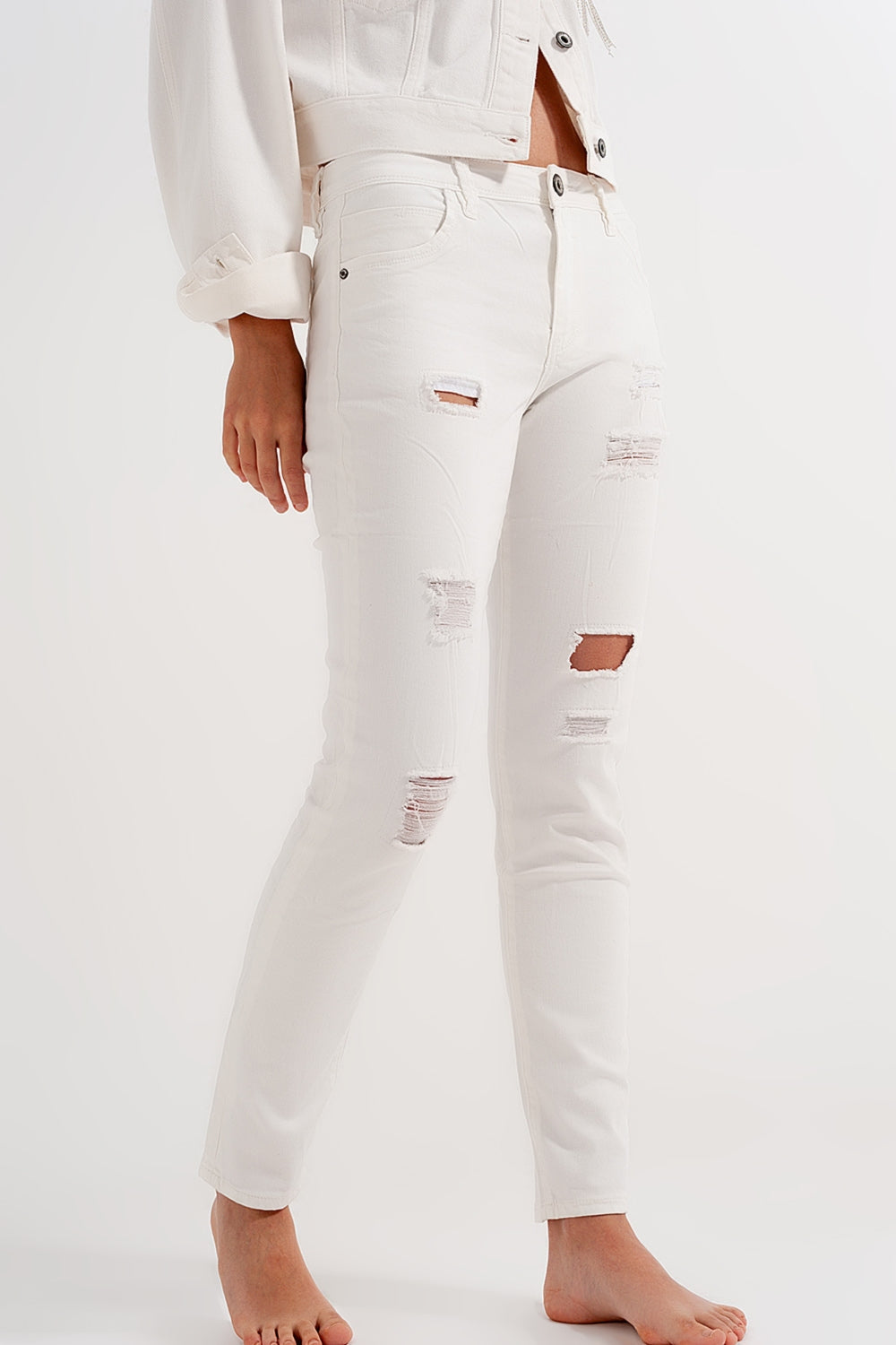 Jean slim avec abrasions blanc
