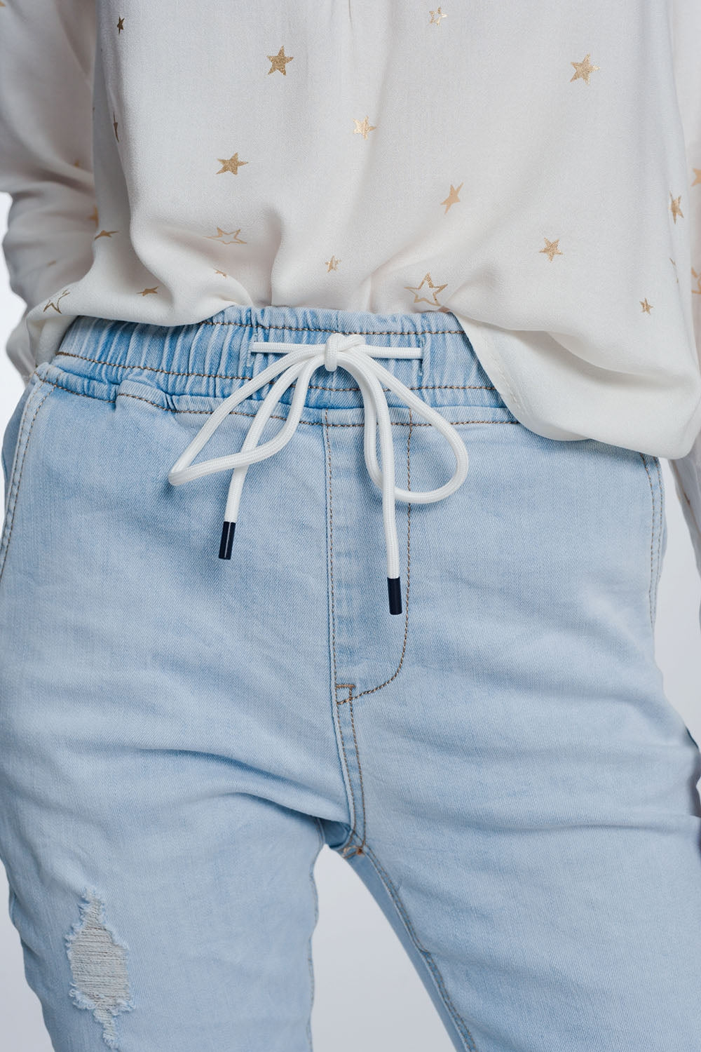 Jean style jogger délavage lumière