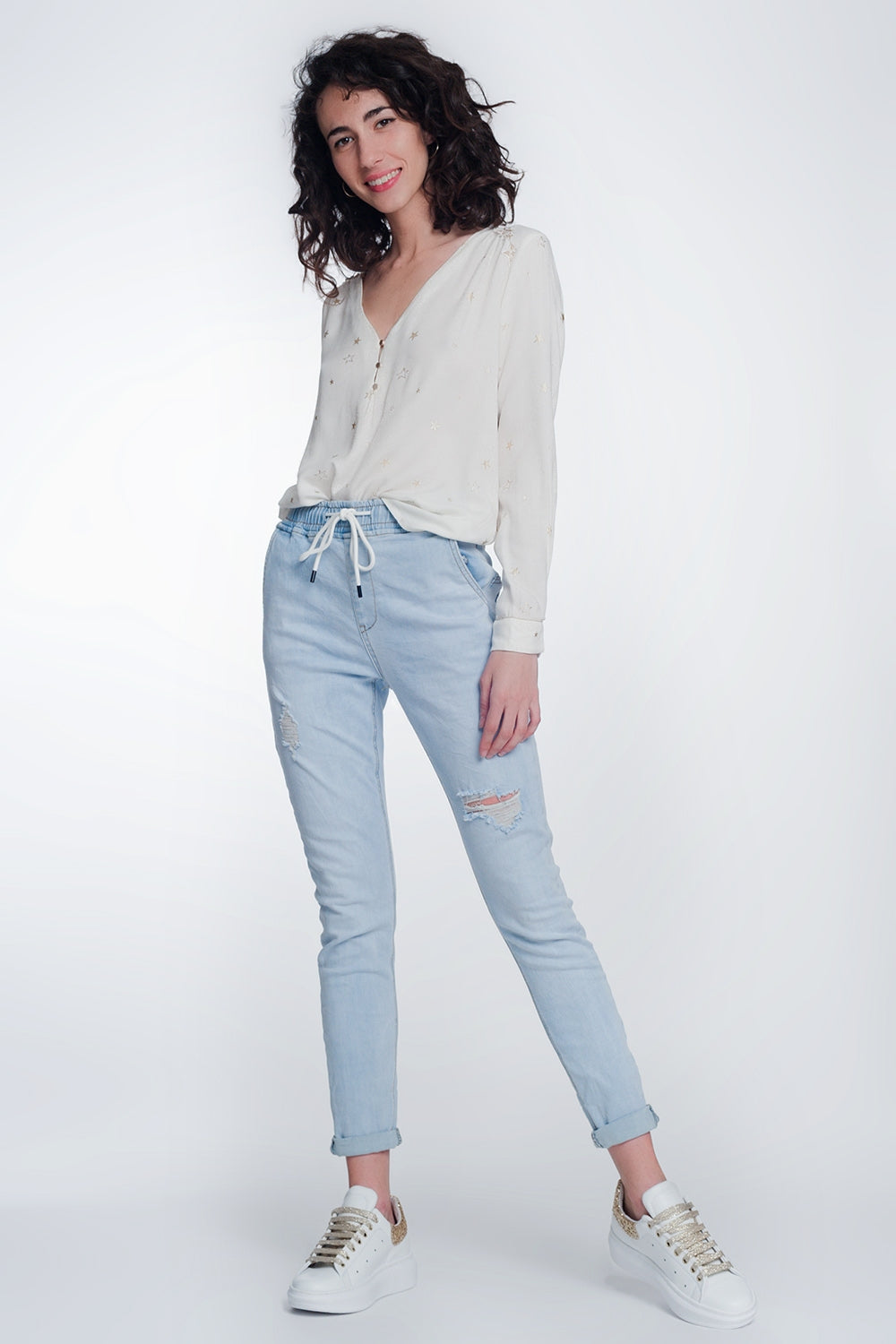 Jean style jogger délavage lumière