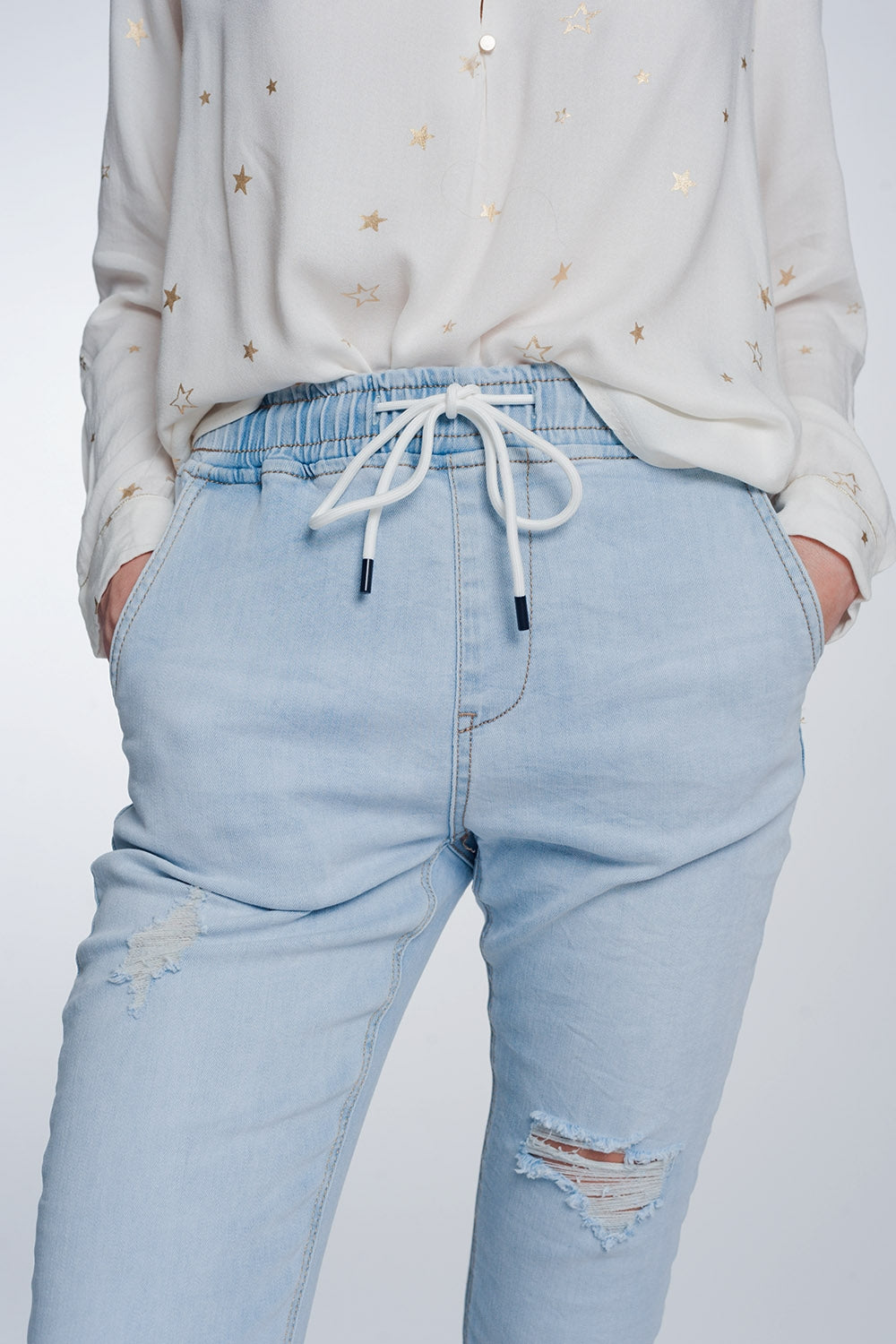 Jean style jogger délavage lumière