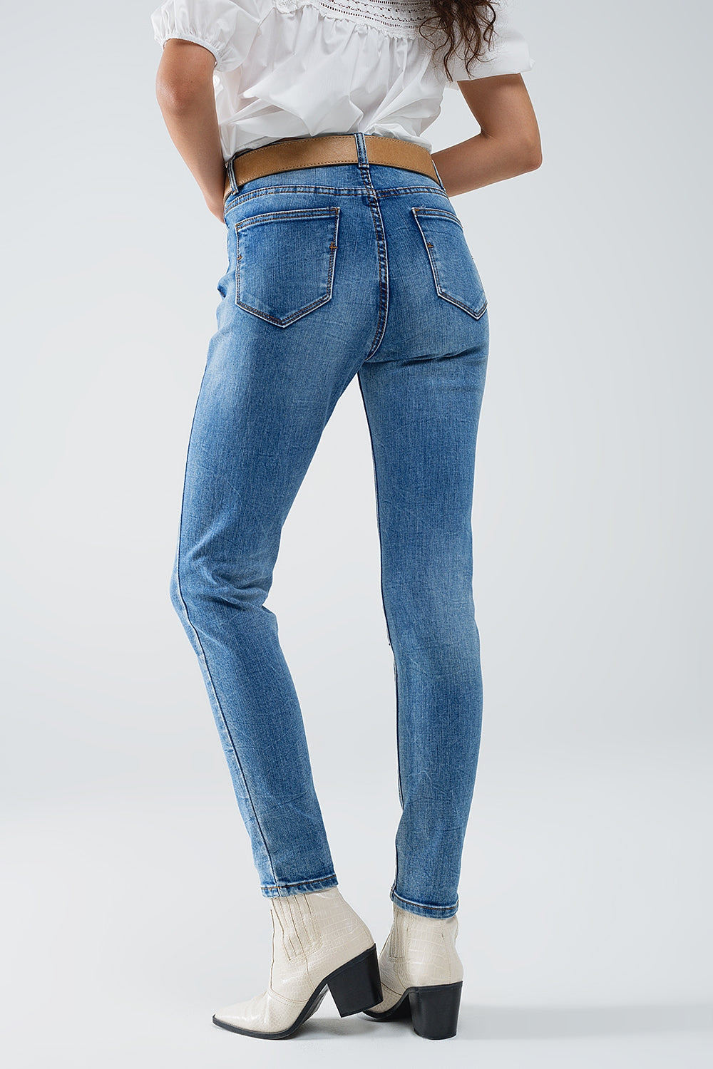 Jean super skinny en denim extensible délavé avec détails en relief