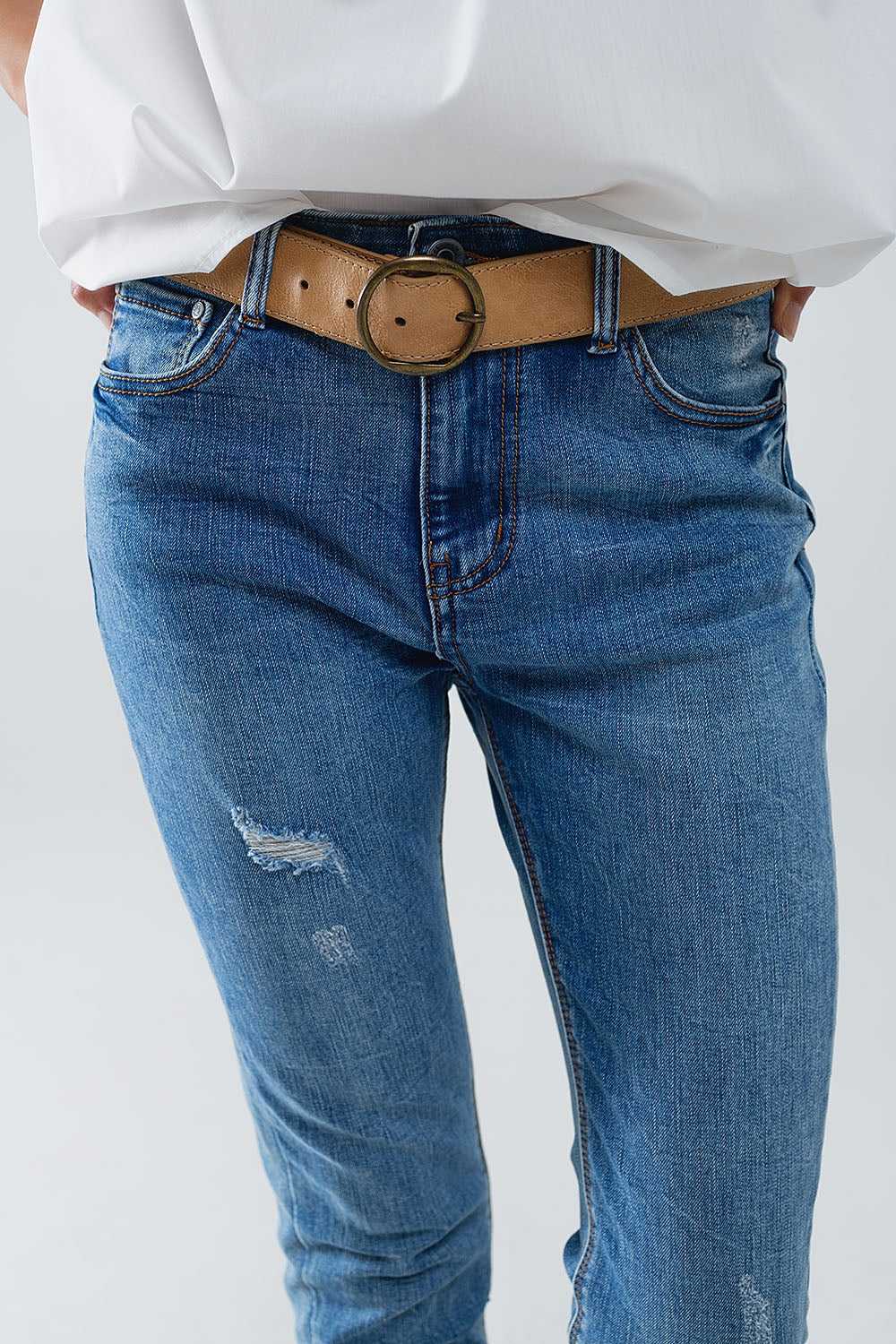Jean super skinny en denim extensible délavé avec détails en relief