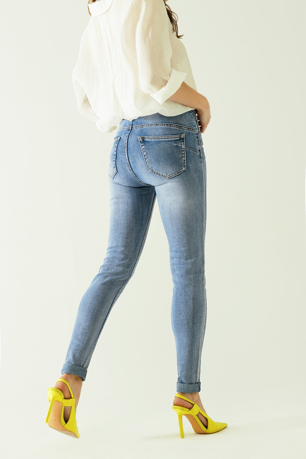 Jean taille haute à cinq poches avec effet poudré argenté