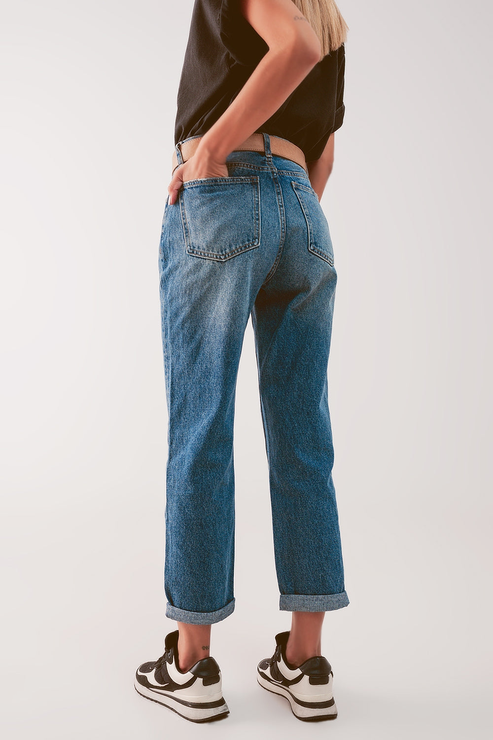 Jean taille haute avec cuisse fendue