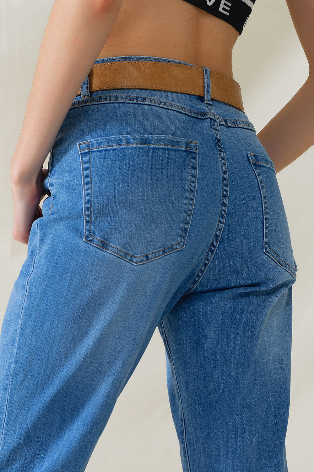 Jean taille haute en denim extensible moyennement délavé