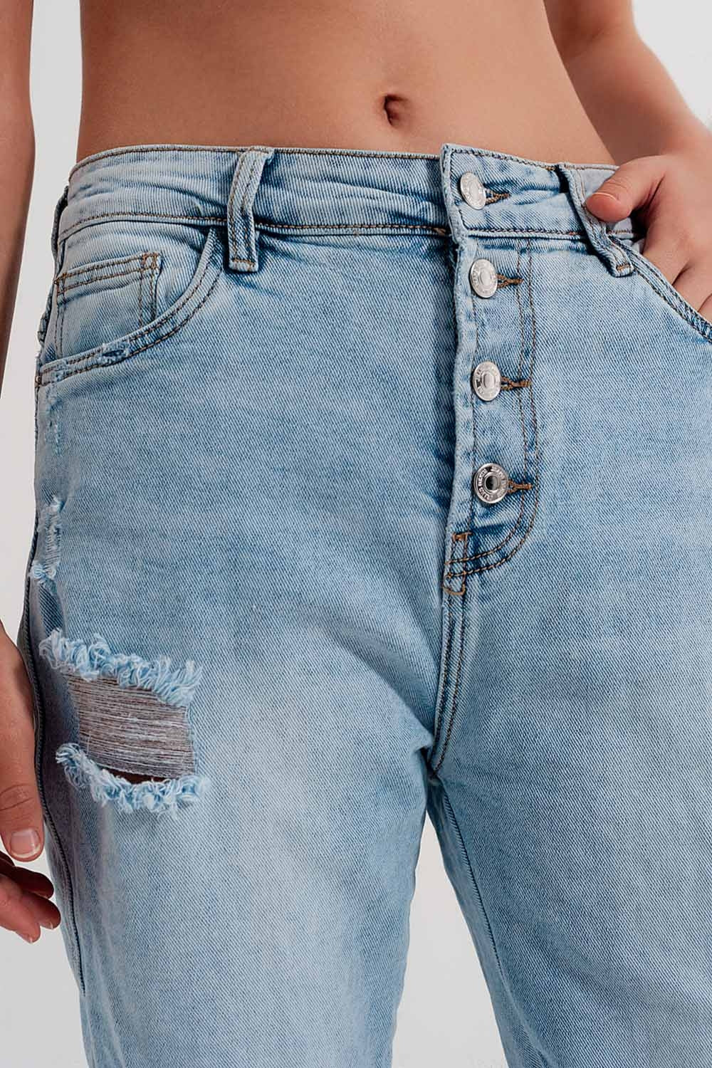 Jean troué droit boutonné effet vieilli bleu clair