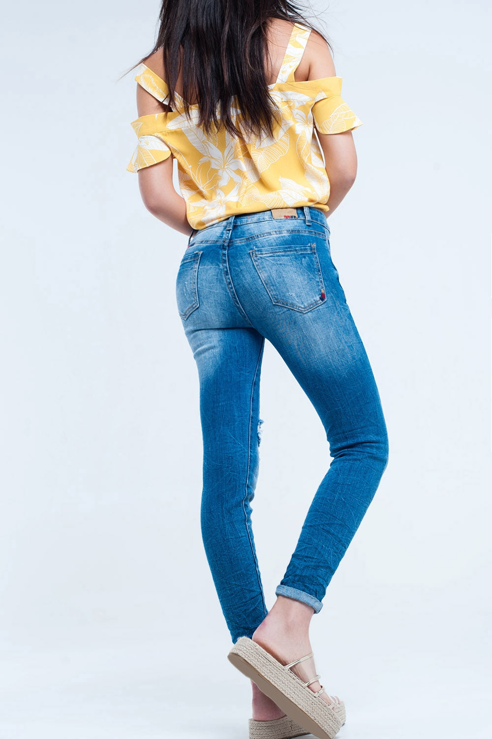 Jeans ajustés Lavage moyen avec déchirures