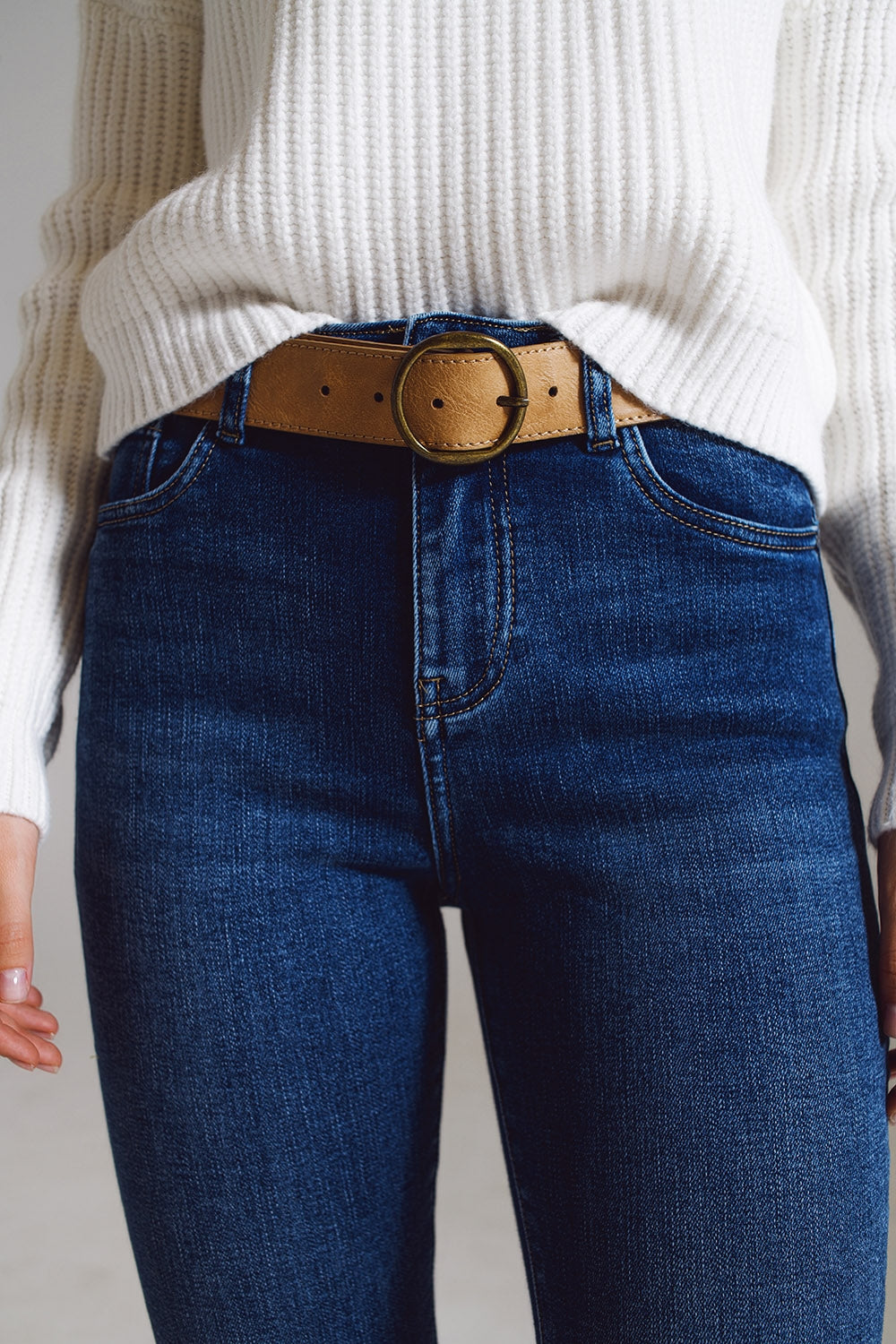 Jeans évasés avec ourlet orné