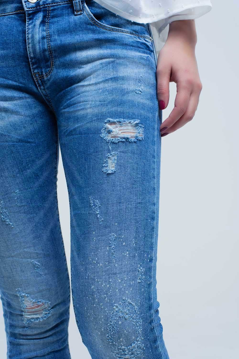 Jeans skinny à lavage moyen avec déchirures