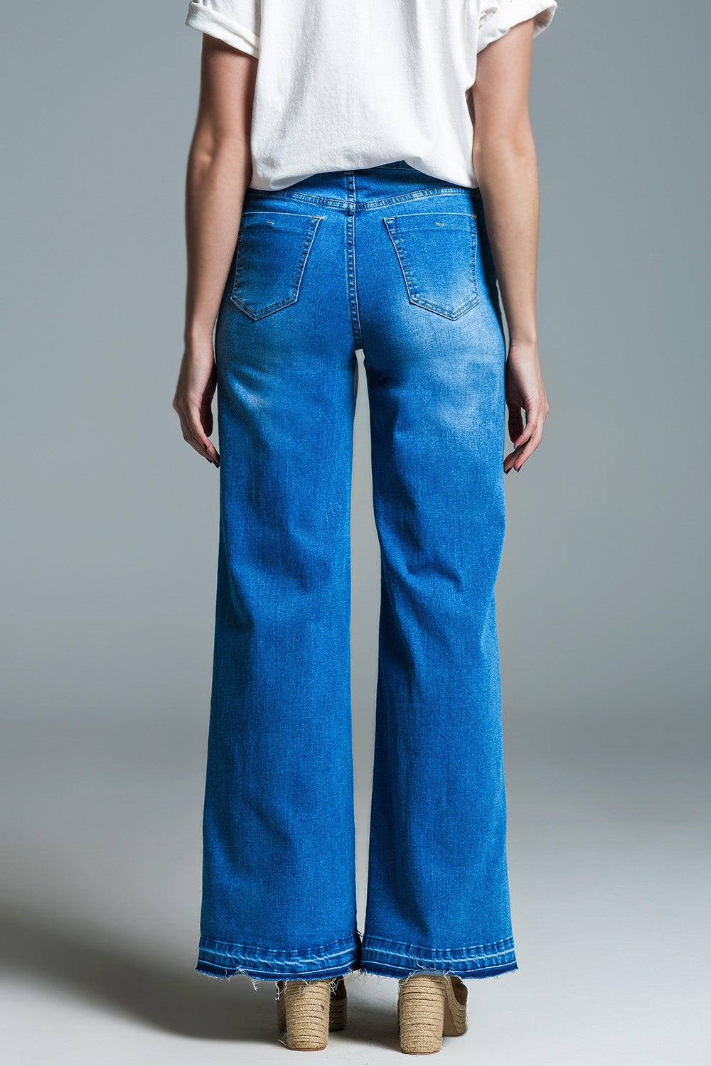 Jeans style palazzo à délavage moyen avec double piqûre à l'ourlet